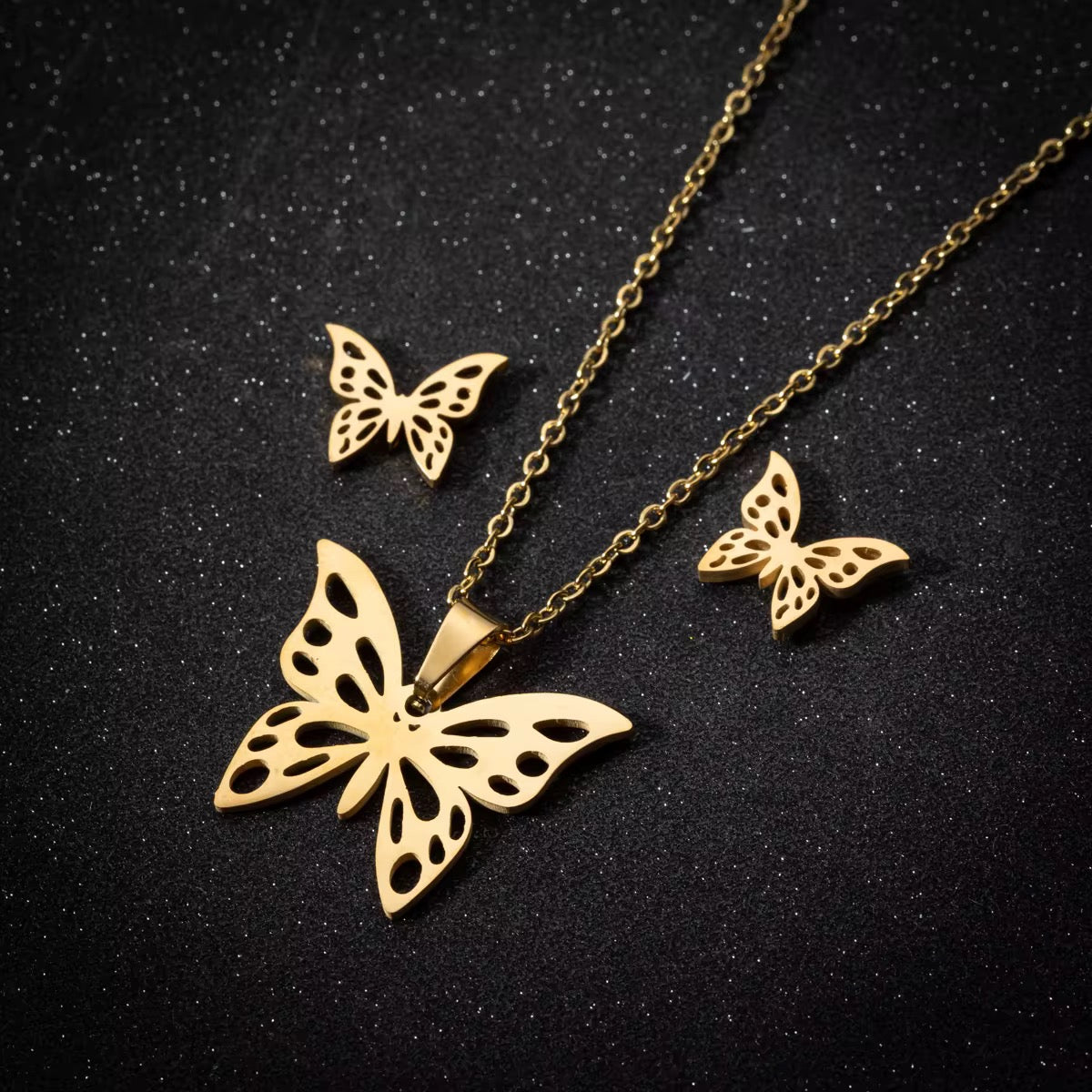 Set de collar y artes con mariposa