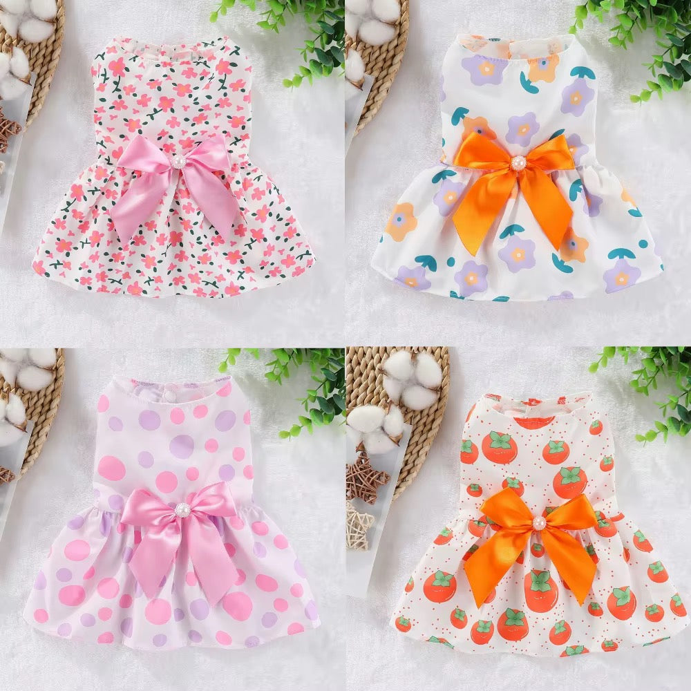 Vestido para mascota con lazitos para el pelo.